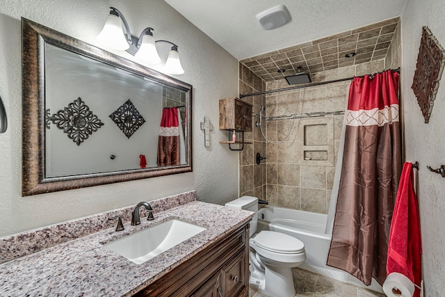 bathroom with toilet, a textured wall, vanity, and shower / tub combo with curtain