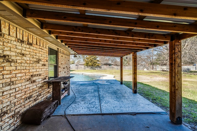 view of patio / terrace with a swimming pool and a fenced backyard