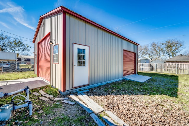 view of outdoor structure with an outdoor structure and fence