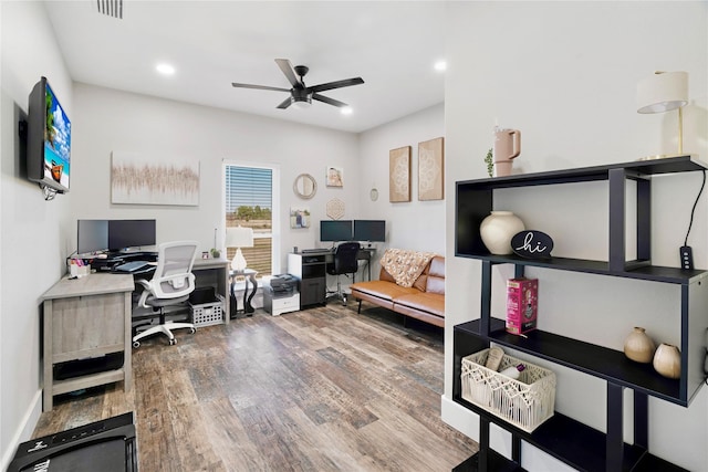 office featuring recessed lighting, wood finished floors, visible vents, baseboards, and a ceiling fan