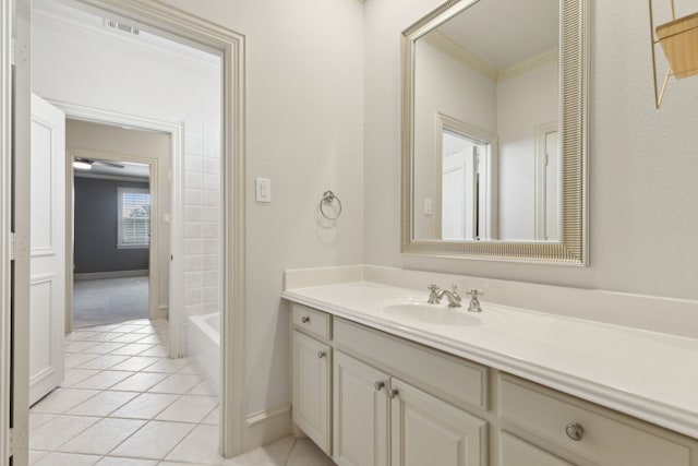 full bathroom with baseboards, visible vents, ornamental molding, tile patterned flooring, and vanity