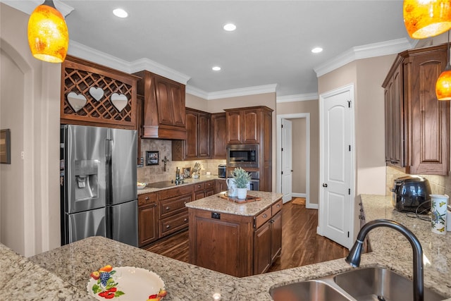 kitchen with dark wood-style floors, stainless steel appliances, a sink, light stone countertops, and custom range hood