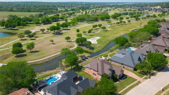 bird's eye view with golf course view, a residential view, and a water view