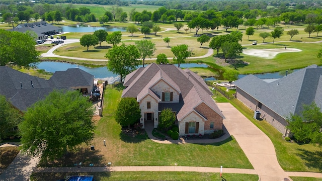 bird's eye view with view of golf course and a water view