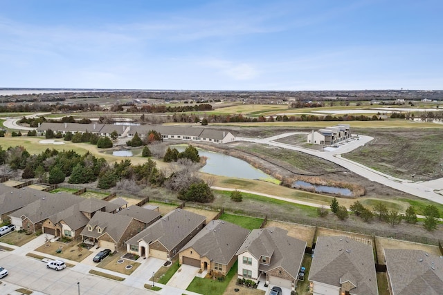 aerial view with a residential view and a water view