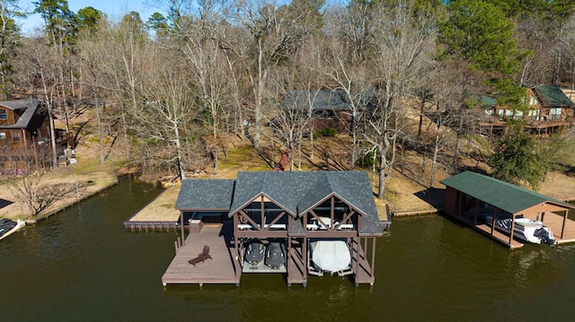 view of dock featuring a water view and boat lift