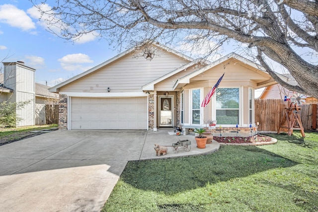 view of front of home with a front lawn, driveway, fence, an attached garage, and brick siding