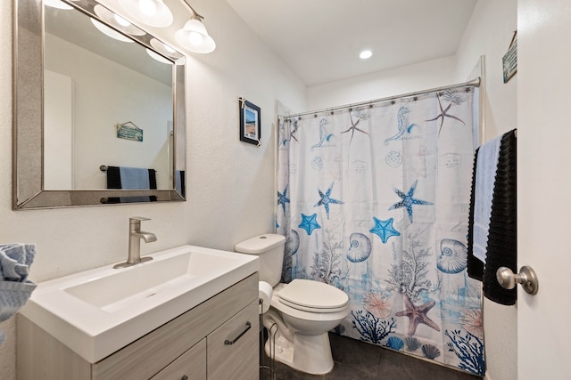 bathroom featuring tile patterned floors, curtained shower, toilet, and vanity