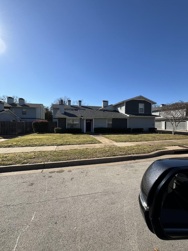 view of front of home with a front yard