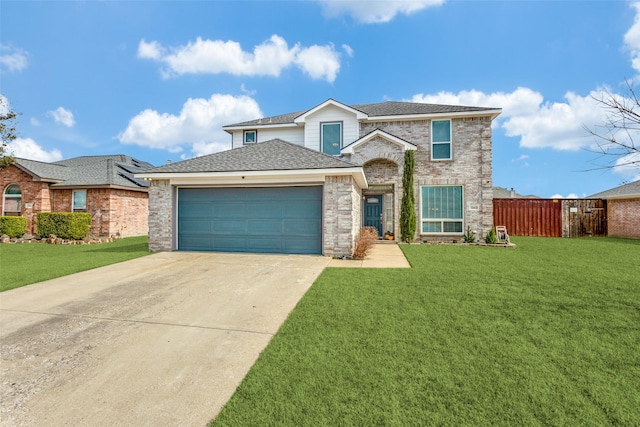 traditional-style house featuring a garage, a front yard, concrete driveway, and fence