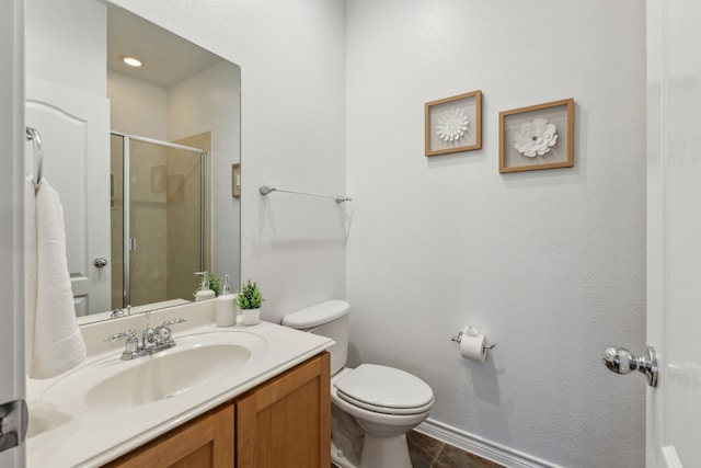 full bath with tile patterned floors, toilet, a shower stall, and vanity