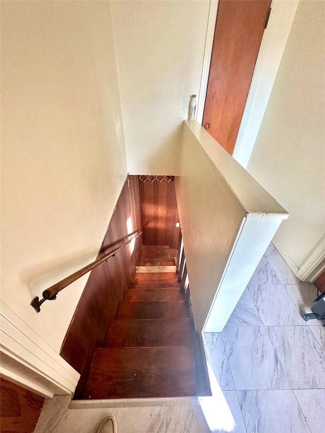 stairway with marble finish floor