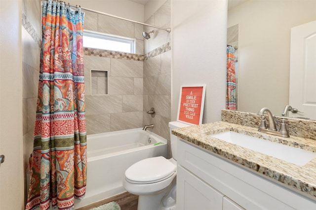 bathroom with toilet, wood finished floors, shower / tub combo with curtain, and vanity