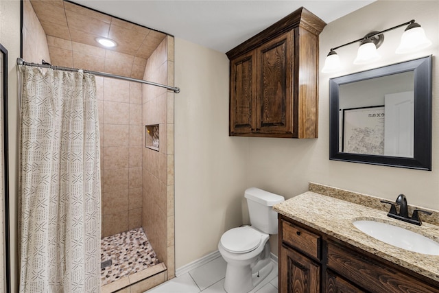 full bath featuring toilet, a shower stall, baseboards, and vanity