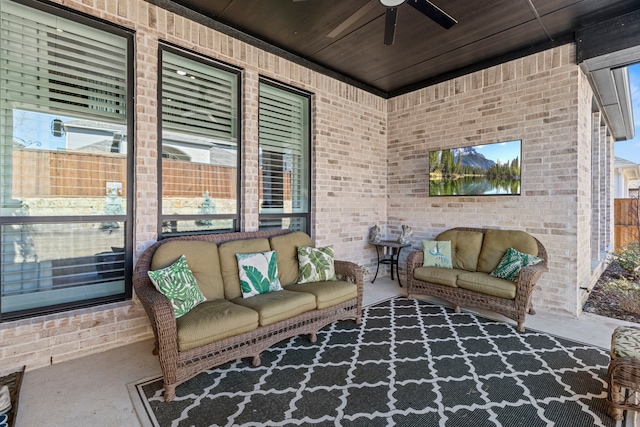 view of patio with ceiling fan and an outdoor hangout area