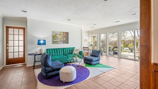 living room featuring crown molding, tile patterned floors, and a textured ceiling