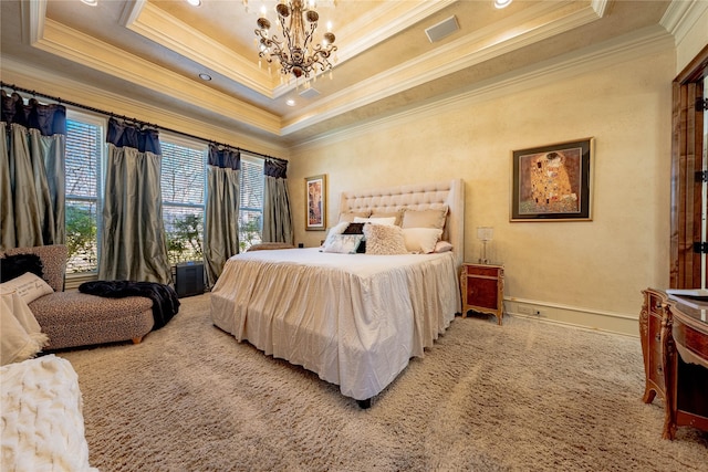 bedroom featuring an inviting chandelier, visible vents, a raised ceiling, and carpet flooring