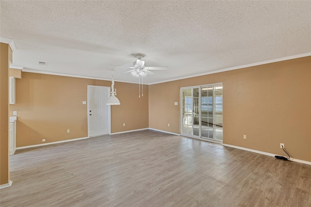 empty room featuring light wood-style floors, ornamental molding, baseboards, and a ceiling fan