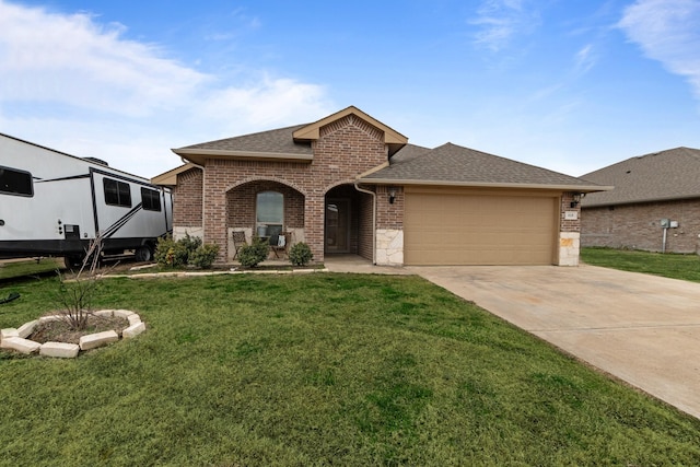 view of front of home featuring brick siding, concrete driveway, roof with shingles, an attached garage, and a front yard