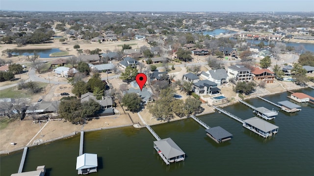 aerial view with a water view and a residential view