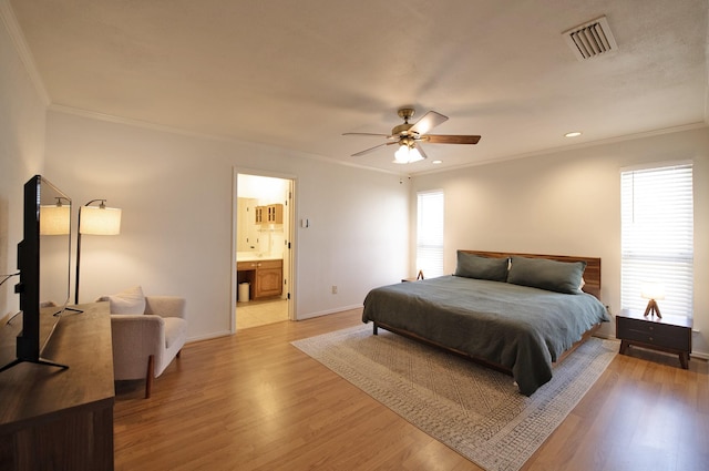 bedroom with baseboards, visible vents, recessed lighting, crown molding, and light wood-type flooring