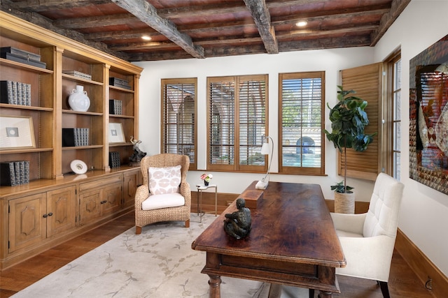 sitting room featuring dark wood-style flooring, wooden ceiling, beamed ceiling, and baseboards