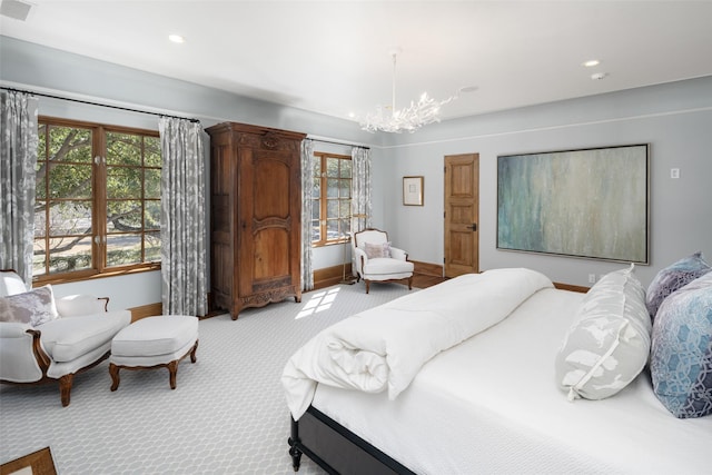 bedroom with a chandelier, recessed lighting, carpet floors, visible vents, and baseboards