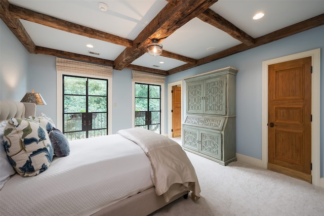 carpeted bedroom featuring access to exterior, visible vents, beamed ceiling, and baseboards