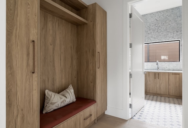 mudroom featuring light floors