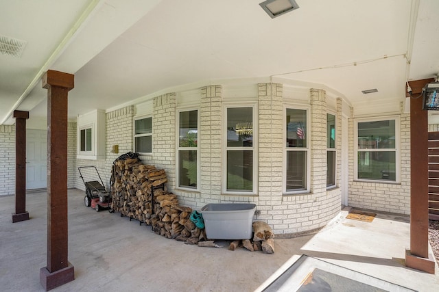 view of patio / terrace featuring visible vents