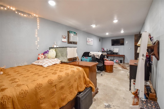 bedroom featuring recessed lighting, concrete floors, and a wall mounted air conditioner