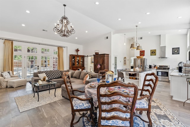 dining space featuring high vaulted ceiling, recessed lighting, french doors, and visible vents