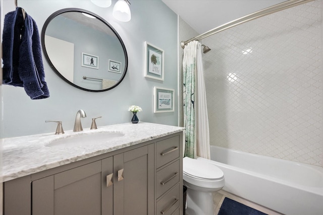 bathroom featuring vanity, toilet, and shower / bath combo with shower curtain