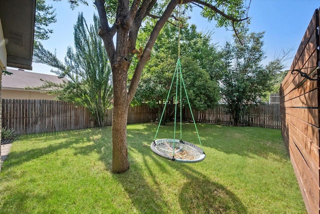 view of yard featuring a fenced backyard