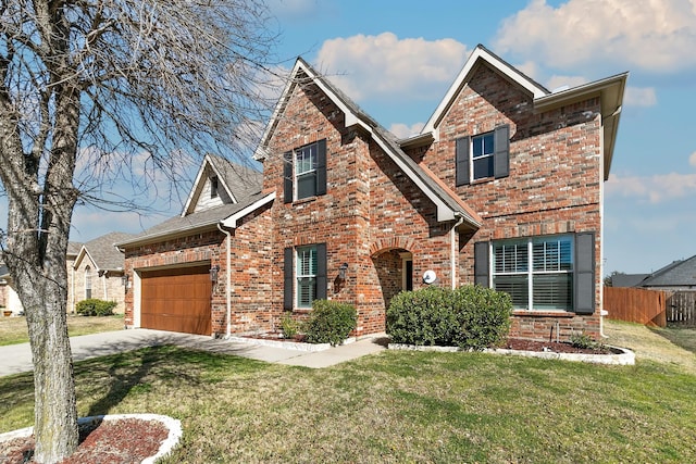 traditional-style house with an attached garage, brick siding, fence, driveway, and a front lawn