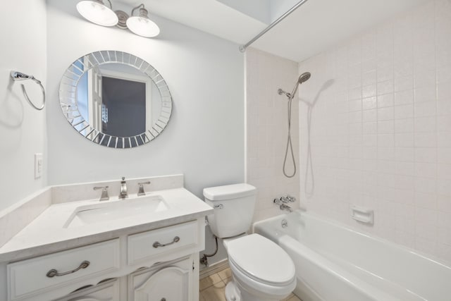 bathroom with toilet, vanity, and bathing tub / shower combination