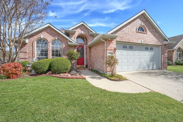 ranch-style home featuring a garage, a front yard, concrete driveway, and brick siding