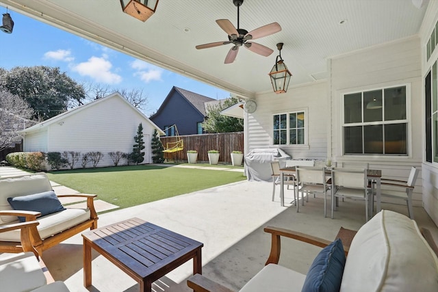 view of patio / terrace with a ceiling fan, grilling area, fence, outdoor dining area, and an outdoor living space