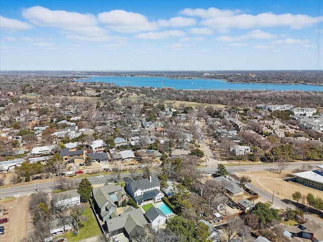 birds eye view of property with a residential view and a water view