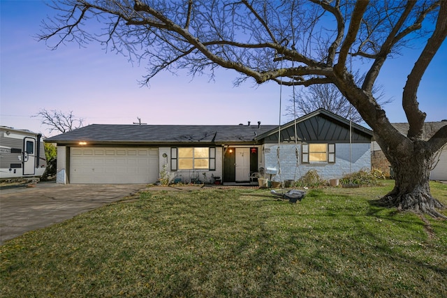 ranch-style house with a garage, driveway, brick siding, and a front lawn