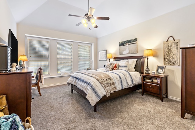 carpeted bedroom featuring ceiling fan, lofted ceiling, and baseboards