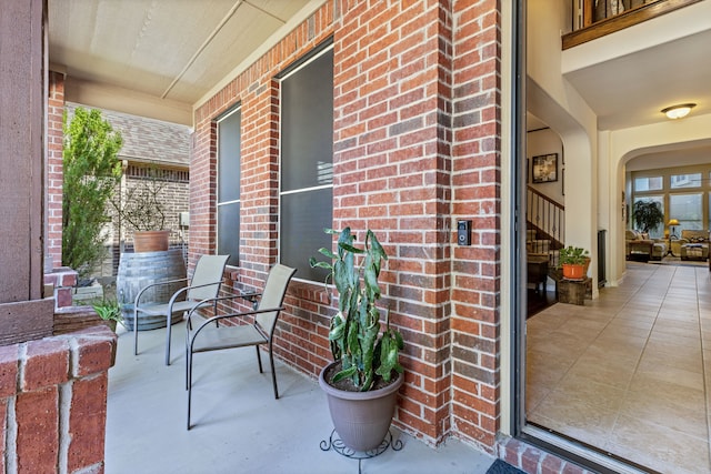 view of patio featuring a porch