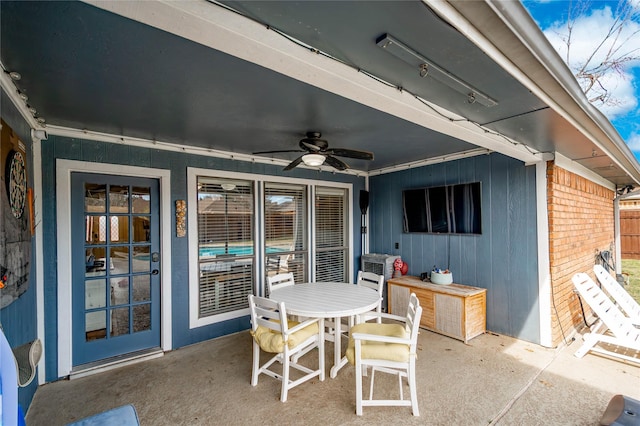 view of patio / terrace featuring a ceiling fan and outdoor dining area