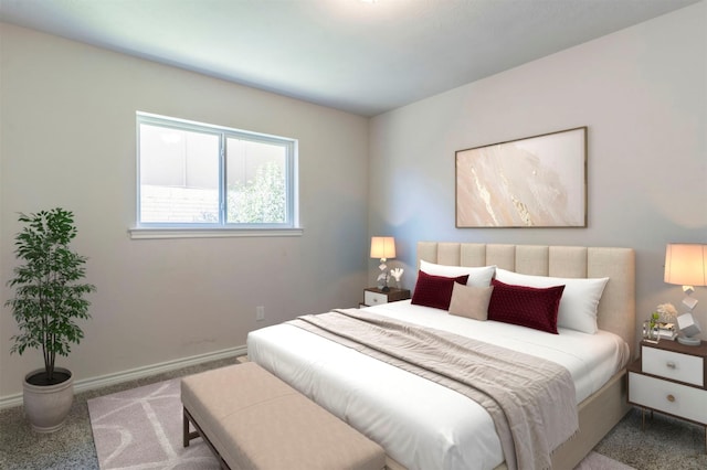 bedroom featuring carpet flooring and baseboards