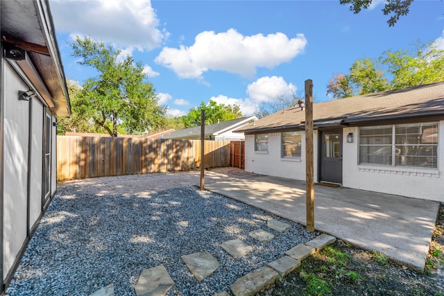 view of yard with a patio area and a fenced backyard