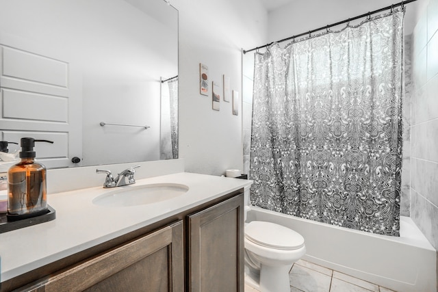 full bath featuring toilet, shower / tub combo with curtain, and vanity
