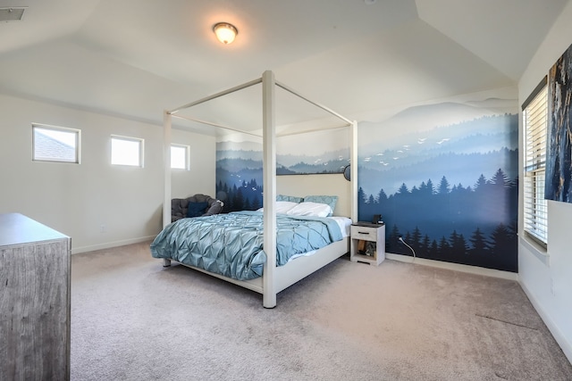 bedroom with carpet floors, lofted ceiling, visible vents, and baseboards