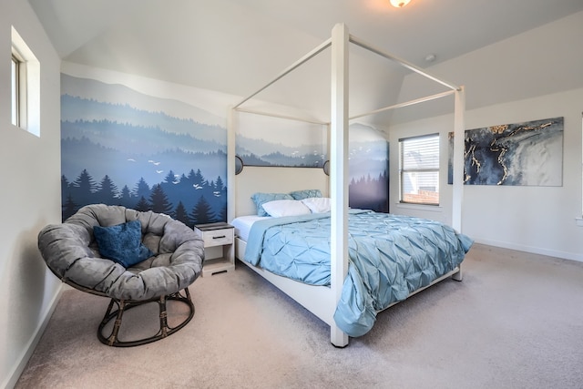 bedroom featuring lofted ceiling, carpet, and baseboards