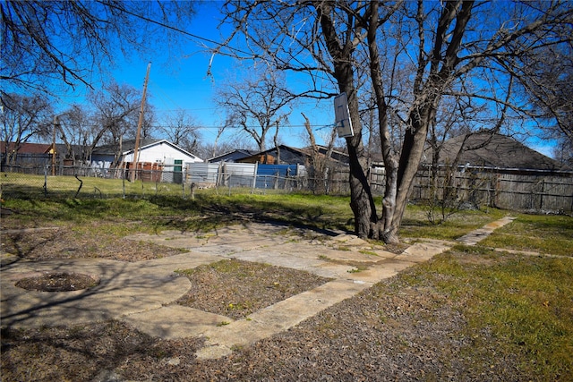 view of yard with fence