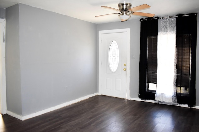 entryway featuring a ceiling fan, dark wood-style flooring, and baseboards